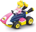 Carrera RC Nintendo Mario Kart 2.4 GHz Mini Collectible Radio Remote Control Toy Car Vehicle - Peach | Official Licensed Mario Miniature Collectible Toy RC Car for Kids 6+, Ready To Run, Rechargeable Battery, Radio RC Racing