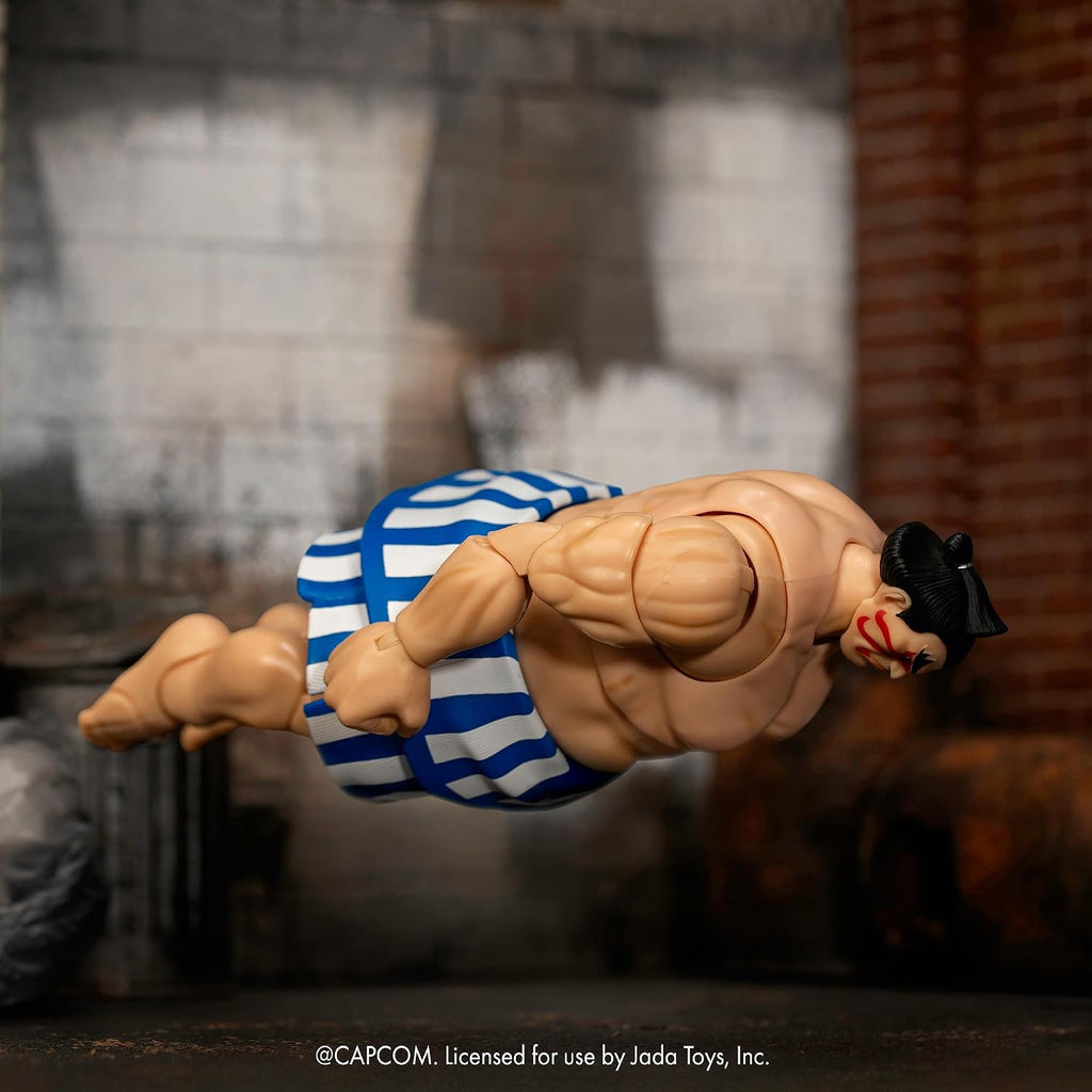 Jada Toys Street Fighter Figure E. Honda (16 cm) - Movable Collectible and Action Figure from Street Fighter 2: The Final Challengers, with Alternative Head, Hands and Accessories, from 13 Years