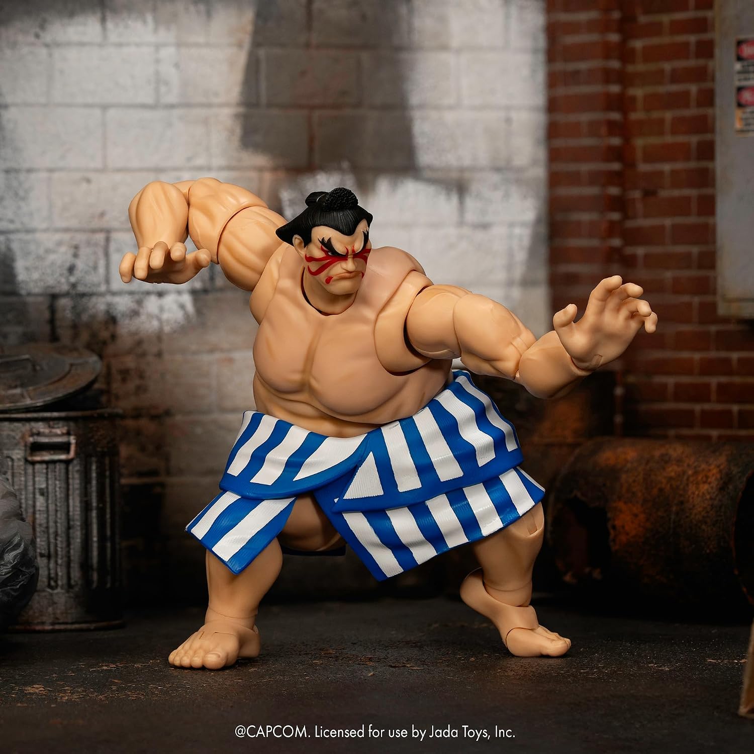 Jada Toys Street Fighter Figure E. Honda (16 cm) - Movable Collectible and Action Figure from Street Fighter 2: The Final Challengers, with Alternative Head, Hands and Accessories, from 13 Years
