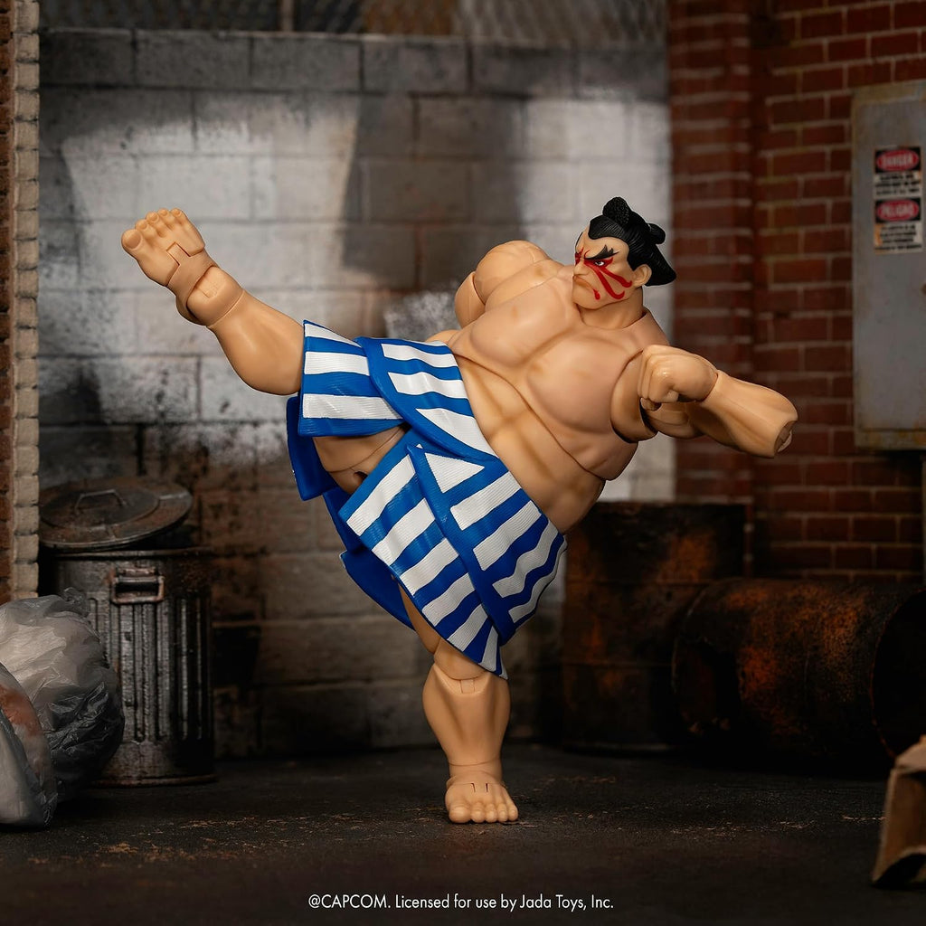 Jada Toys Street Fighter Figure E. Honda (16 cm) - Movable Collectible and Action Figure from Street Fighter 2: The Final Challengers, with Alternative Head, Hands and Accessories, from 13 Years