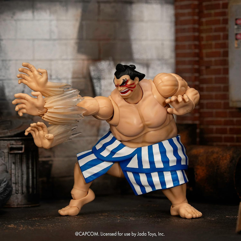 Jada Toys Street Fighter Figure E. Honda (16 cm) - Movable Collectible and Action Figure from Street Fighter 2: The Final Challengers, with Alternative Head, Hands and Accessories, from 13 Years